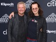 FILE: Inductees Alex Lifeson (L) and Geddy Lee of RUSH pose at the 31st Annual Rock And Roll Hall of Fame Induction Ceremony at Barclays Center on Apr. 7, 2017 in New York City. /
