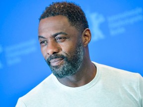 FILE: British actor, director and executive producer Idris Elba poses during a photo call for the film "Yardie" shown in the "Panorama Special" category during the 68th edition of the Berlinale film festival in Berlin on February 22, 2018. /