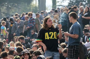 A marijuana user smokes marijuana during a 420 Day celebration on "Hippie Hill" in Golden Gate Park April 20, 2010 in San Francisco, California. (Photo by Justin Sullivan/Getty Images)