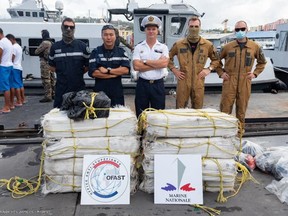Officials pose with drugs confiscated recently off of Martinique. /