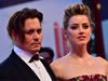 FILE: Johnny Depp and Amber Heard  arrive for the screening of the movie "The Danish Girl" presented in competition at the 72nd Venice International Film Festival on Sept. 5, 2015 at Venice Lido. /