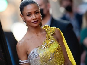 FILE: English actress Thandiwe Newton arrives for the Warner Bros premiere of "Reminiscence" at the TCL Chinese theatre on Aug. 17, 2021 in Hollywood, Calif. /