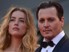 FILE: Johnny Depp and Amber Heard arrive for screening of the movie "Black Mass" presented out of competition at the 72nd Venice International Film Festival on September 4, 2015 at Venice Lido.