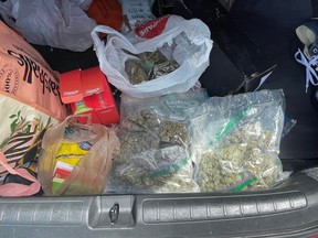 Marijuana and other weed products discovered in vehicle trunk. /