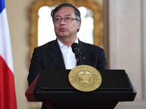 FILE: Colombian President Gustavo Petro speaks gestures during a press conference with his Chilean counterpart Gabriel Boric in Casa Narino palace in Bogota, on Aug. 8, 2022. /