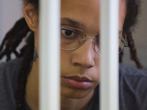 FILE: In this file photo taken on Aug. 04, 2022 US' Women's National Basketball Association basketball player Brittney Griner waits for the verdict inside a defendants' cage during a hearing in Khimki outside Moscow. /