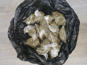 Police photo of some of the packaged cannabis recovered during raid. /