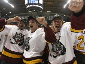 FILE: Members of the Chicago Wolves celebrate a championship win over the Wilkes-Barre/Scranton Penguins during the Calder Cup Finals on June 10, 2008 at the Allstate Arena in Rosemont, Ill. /