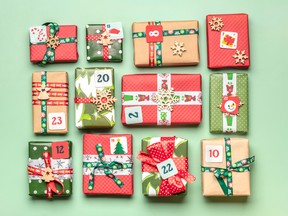 Red, green gift boxes form an advent calendar