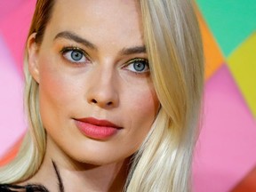 Australian actor Margot Robbie poses on the red carpet upon arrival for the World Premiere of the film 'Birds of Prey' in London on Jan. 29, 2020. /