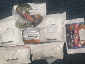 A photo issued by the Merseyside Police shows a bag of Aunt Bessie's roast potatoes, along with drugs found in a raid.