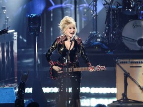 FILE - Dolly Parton performs on stage at the 37th Annual Rock & Roll Hall of Fame Induction Ceremony in Los Angeles, California, U.S., November 6, 2022.