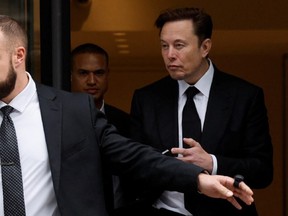 Tesla CEO Elon Musk leaves the local office in Washington