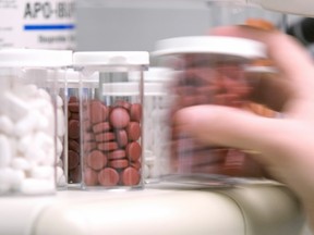 Pharmacist was alleged to be connected to 700 oxycodone pills Saskatoon Police seized in a drug investigation.