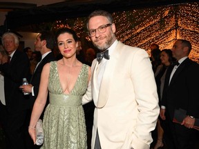 FILE - Seth Rogen (R) and his wife Lauren Miller attend the 95th Annual Academy Awards Governors Ball in Hollywood, California on March 12, 2023.