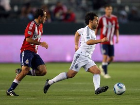 Davide Chiumiento in action against Chivas USA in June. The Caps are back at the Home Depot Center tonight, this time to face the L.A. Galaxy. (Getty Images)