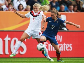 Kaylyn Kyle battles against France in the Women's World Cup. (Getty Images)