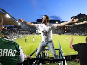 The Timbers Army get ready for Portland's win over New England. (Tom Hauck/Getty Images)