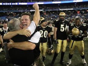 Manitoba head coach Brian Dobie celebrates the Bisons' 2007 Vanier Cup victory. (National Post photo)