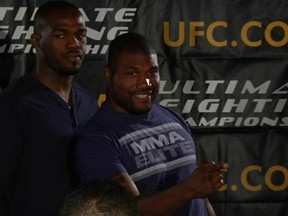 Quinton "Rampage" Jackson (right) mugs for the camera as UFC light heavyweight champion Jon Jones stare ahead at a UFC 135 press event earlier this year.