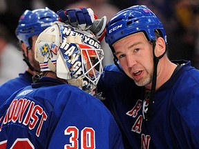New York Rangers goalie Henrik Lundqvist (30) is congratulated by defenseman Anders Eriksson (25) after defeating the Toronto Maple Leafs, 5-1, at Madison Square Garden in New York, Wednesday, April 7, 2010. (Christopher Pasatieri/Newsday/MCT) [PNG Merlin Archive]