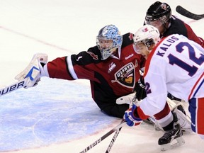 Vancouver Giants' new goalie Adam Morrison in action against Spokane Chiefs Wednesday. Photograph by: Steve Bosch, PNG
