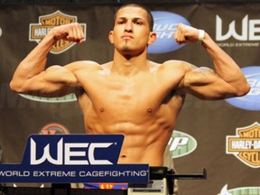 This is Anthony Pettis. He likes to run up the cage and kick people in the face. For real. Check him out Saturday evening on Spike TV. (photo courtesy of MMAjunkie.com)