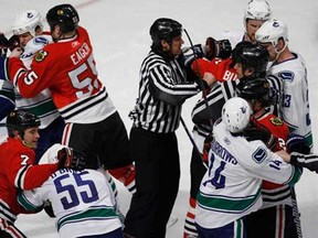 The Canucks and Blackhawks get it on.