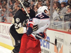 PITTSBURGH —  Matt Cooke was suspended four games for this hit from behind on Fedor Tyutin of the Columbus Blue Jackets on Feb, 8, 2011.  (Photo by Jamie Sabau/Getty Images)