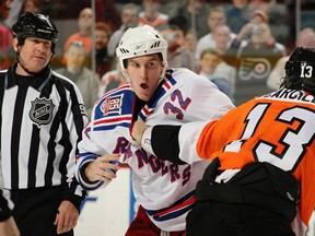 Last December, Dale Weise and Daniel Carcillo swapped punches in Weise's NHL debut. Getty Images photo