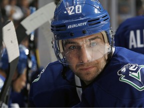 VANCOUVER — Chris Higgins looks on from the bench during Oct. 22 game against Minnesota. The hard-working Canucks winger had two goals Saturday in a 7-4 win over Washington. (Photo by Jeff Vinnick/NHL via Getty Images)