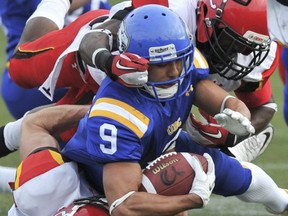 UBC's Sam Carino is tackled on a kick return Saturday at T-Bird Stadium. (Jason Payne, PNG photo)