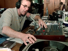 Veteran MuchMusic host Terry David Mulligan in 1998 busy taping his weekly radio show in his home studio.