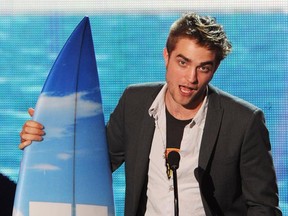 From a surfboard to Hollywood immortality, Robert Pattinson's success is like Puff Daddy – Can't stop, won't stop!  (Kevin Winter/Getty Images)