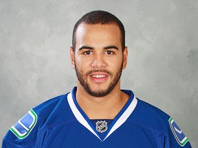VANCOUVER, CANADA - SEPTEMBER 9:  Darren Archibald of the Vancouver Canucks poses for his official headshot for the 2011-2012 NHL season at Rogers Arena in Vancouver, British Columbia, Canada. (Photo by Jeff Vinnick/NHLI via Getty Images)