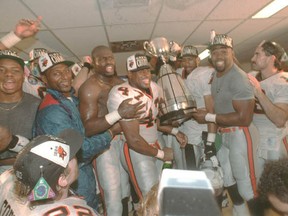 The BC Lions celebrate their 1994 Grey Cup win in the locker room. (Rick Loughran/Province files)