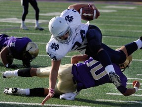 Notre Dame's Ante Litre battles for yardage Friday against Vancouver College. (PNG photo)