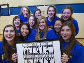 Handsworth's Katie Marlowe (centre) designed the official logo for the 2011 BC Senior Girls Quadruple A volleyball championships she and her teammates will host and hope to win beginning Thursday. (Photo -- Ward Perrin, PNG)