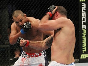 SAN JOSE, CA - NOVEMBER 19: (R-L) Mauricio Rua and Dan Henderson exchange punches during an UFC Light Heavyweight bout at the HP Pavillion on November 19, 2011 in San Jose, California.  (Photo by Josh Hedges/Zuffa LLC/Zuffa LLC via Getty Images)