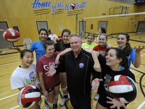 Head coach Ken Forbes and the 2011-12 McMath Wildcats, B.C.'s No. 1-ranked 4A senior girls volleyball team. (Mark van Manen, PNG photo)