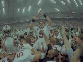 Lui Passaglia is lifted onto teammates' shoulders after the 1994 Grey Cup. (Arlen Redekop/Province files)