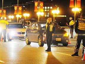 Vancouver Police conduct a Counter Attack roadblock on the Cambie Street bridge last year. RIC ERNST/PNG FILE