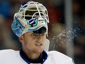 ANAHEIM — Cory Schneider lets loose after taking a water break against the Ducks on Nov. 11. Tonight, he hopes to tighten up loose ends in his game against the Ottawa Senators at Rogers Arena. (Getting Images/via National Hockey League).