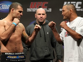 SAN JOSE, CA - NOVEMBER 18:  (L-R) Light Heavyweight opponents Mauricio "Shogun" Rua and Dan Henderson face off after weighing in during the UFC 139 Weigh In at the HP Pavilion on November 18, 2011 in San Jose, California.  (Photo by Josh Hedges/Zuffa LLC/Zuffa LLC via Getty Images)