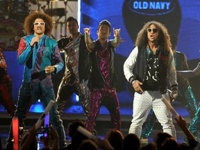 Singers Redfoo and SkyBlu of LMFAO perform onstage at the 2011 American Music Awards held at Nokia Theatre L.A. LIVE on November 20, 2011 in Los Angeles, California.  (Photo by Kevork Djansezian/Getty Images)