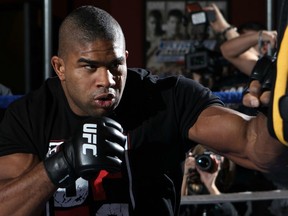 LAS VEGAS, NV - DECEMBER 27:  Alistair Overeem works out for the press during the UFC 141 Open Workouts at the Ultimate Fighter Gym on December 27, 2011 in Las Vegas, United States.  (Photo by Josh Hedges/Zuffa LLC/Zuffa LLC via Getty Images)
