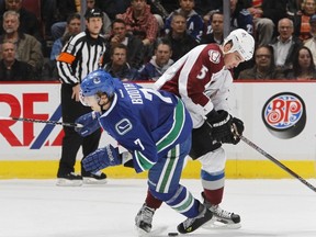 David Booth wasn't hurt on this collision with Shane O'Brien, but was soon after when Kevin Porter hit the Canucks forward knee-on-knee on Tuesday.