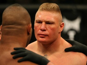 LAS VEGAS, NV - DECEMBER 30: Brock Lesnar (right) faces off with Alistair Overeem (left) before their fight during the UFC 141 event at the MGM Grand Garden Arena on December 30, 2011 in Las Vegas, Nevada. (Photo by Donald Miralle/Zuffa LLC/Zuffa LLC via Getty Images)