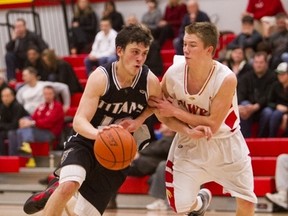South Kamloops point guard Elijah Hillis-Gold (left) in action against the W.J. Mouat Hawks on Saturday in Abbotsford. (Photo by Bob Frid/Special to PNG)