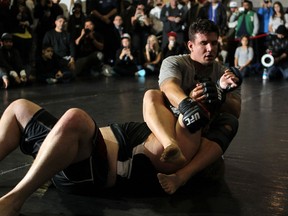 TORONTO, ON - DECEMBER 07:  Frank Mir works out for the fans and media during the UFC 140 Open Workouts at the Xtreme Couture Gym on December 7, 2011 in Toronto, Ontario.  (Photo by Josh Hedges/Zuffa LLC/Zuffa LLC via Getty Images)